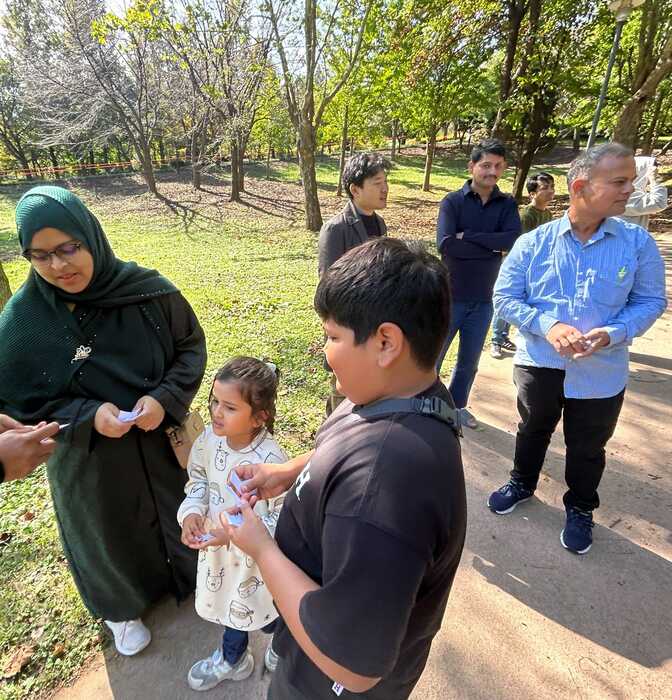 Children and adults connecting during a park outing