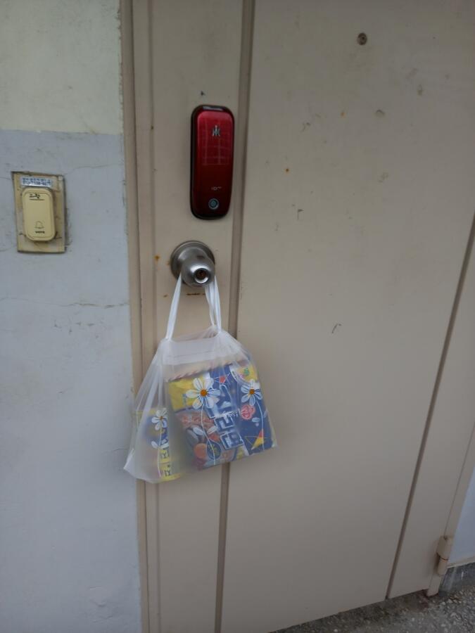 A food package left safely at a resident's door