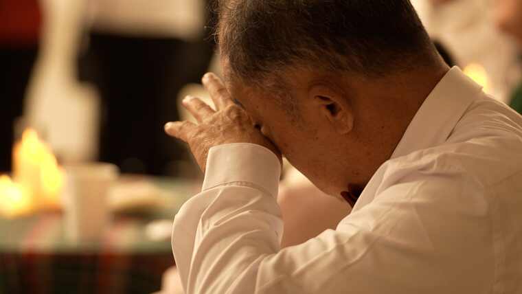 A participant overcome with emotion during the closing concert