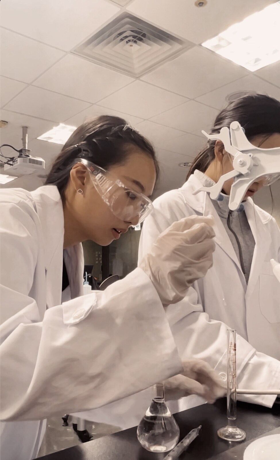 Grace conducting a laboratory experiment