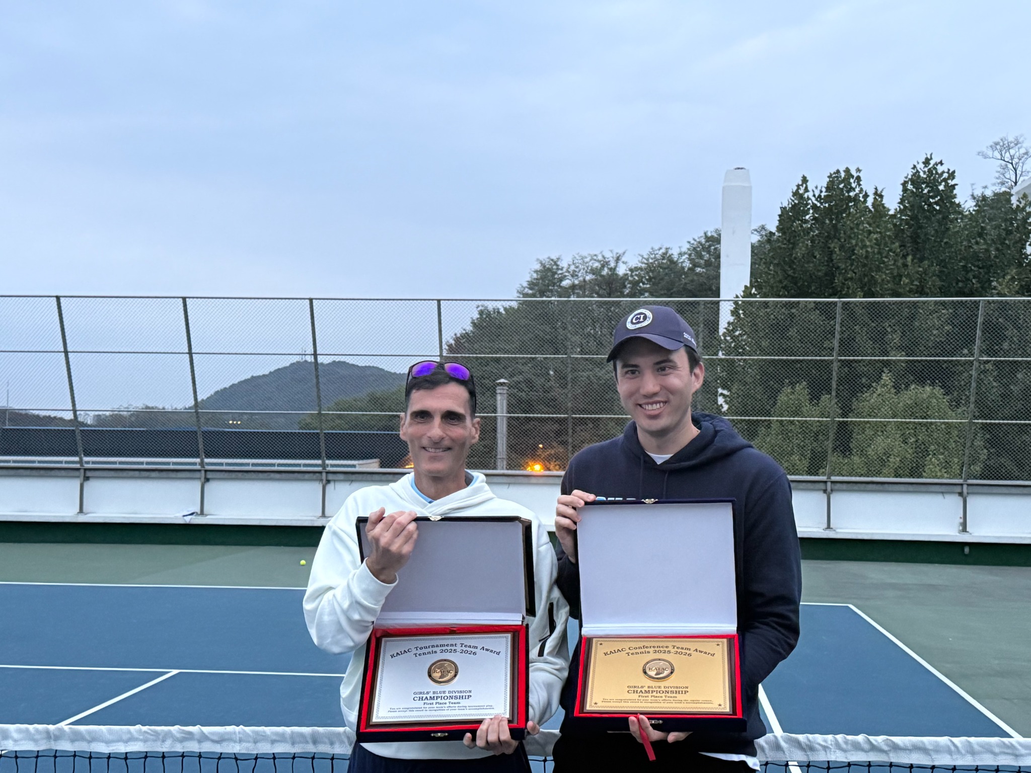 Coaches and team leaders with championship awards