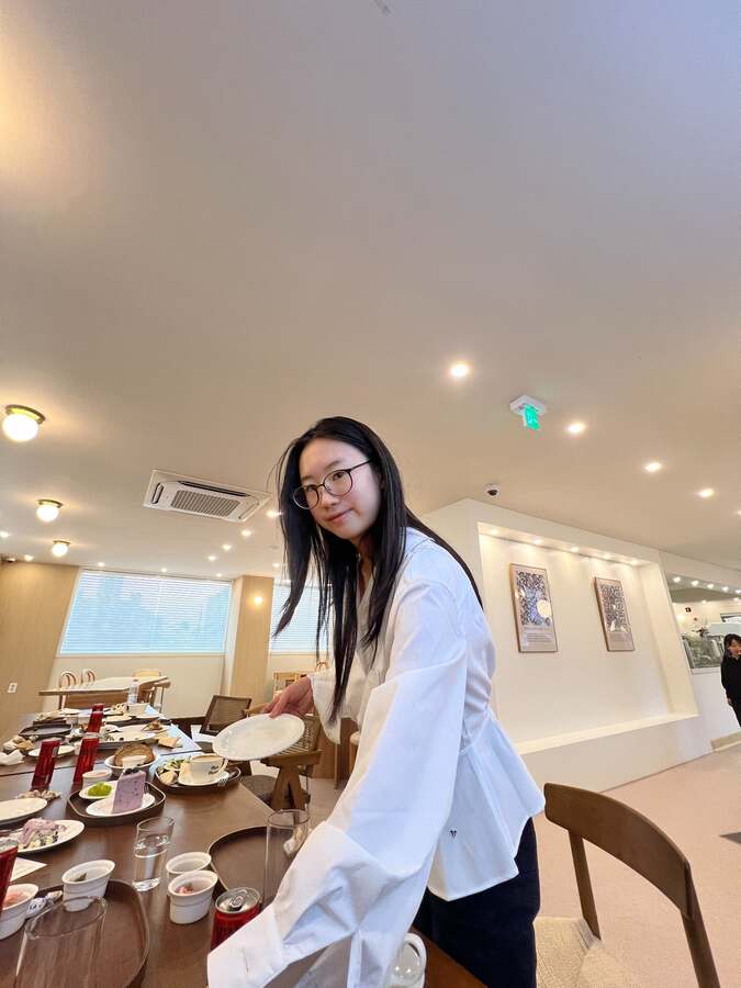 Grace participating in the social café